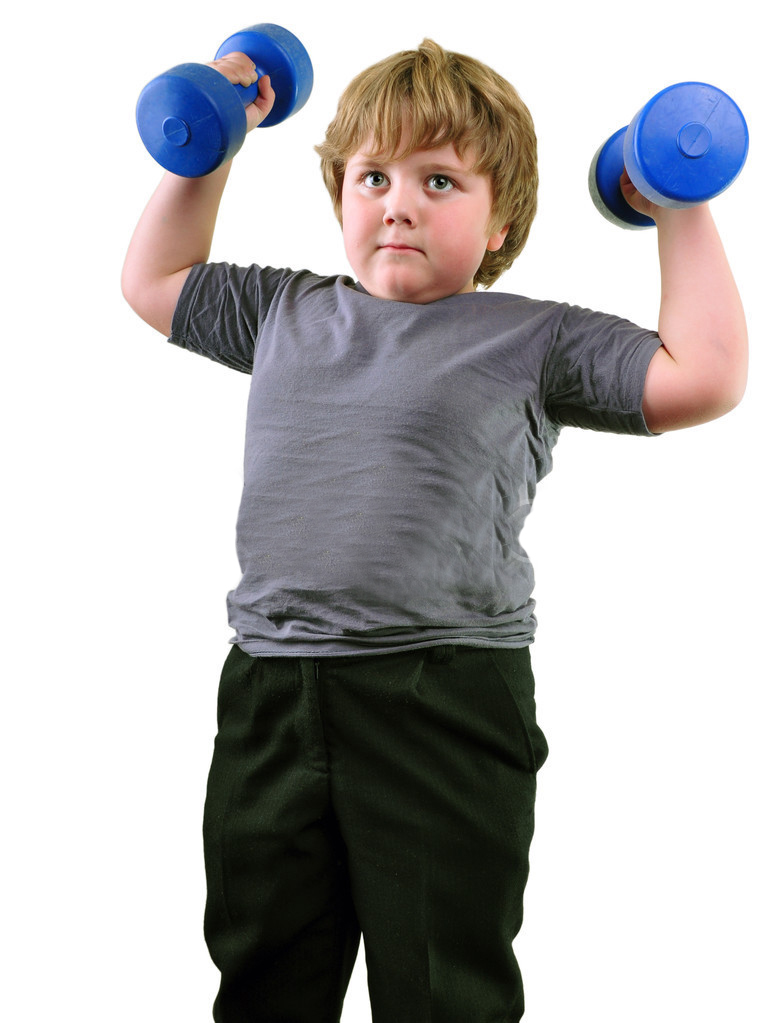 depositphotos 55126231 Isolated portrait of elementary age boy with dumbbells exercising